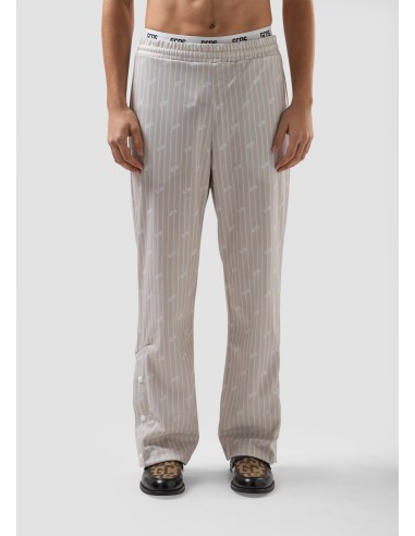 GCDS Pantaloni track gessati con logo all over